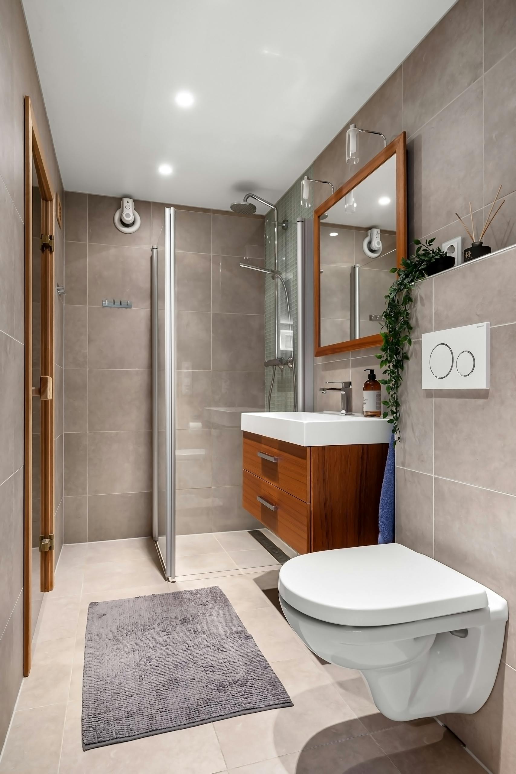 Stylish bathroom in hotel with modern fixtures and elegant interior design.